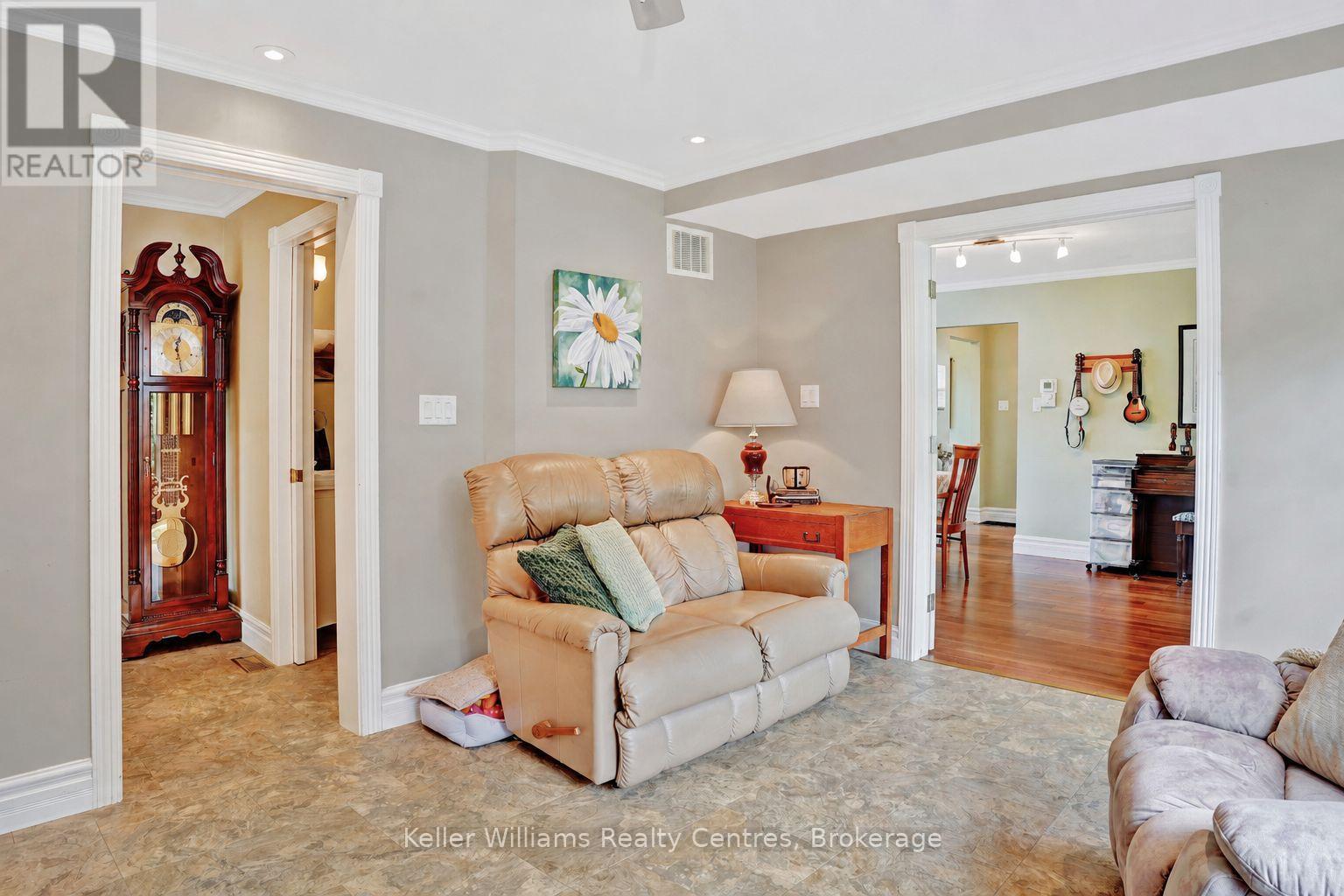 Bright front living room with grandfather clock