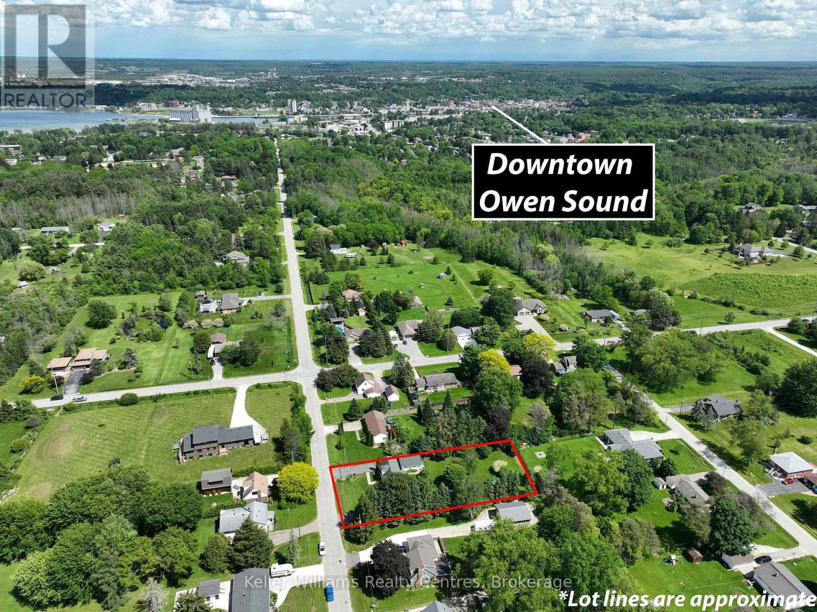 Aerial view of 880 16th Street W with downtown Owen Sound on the horizon